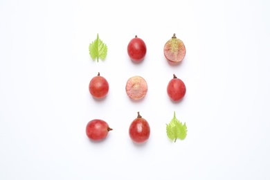 Photo of Composition with fresh ripe grapes and leaves on white background, top view