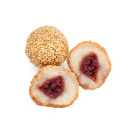 Delicious sesame balls with red bean paste on white background, top view
