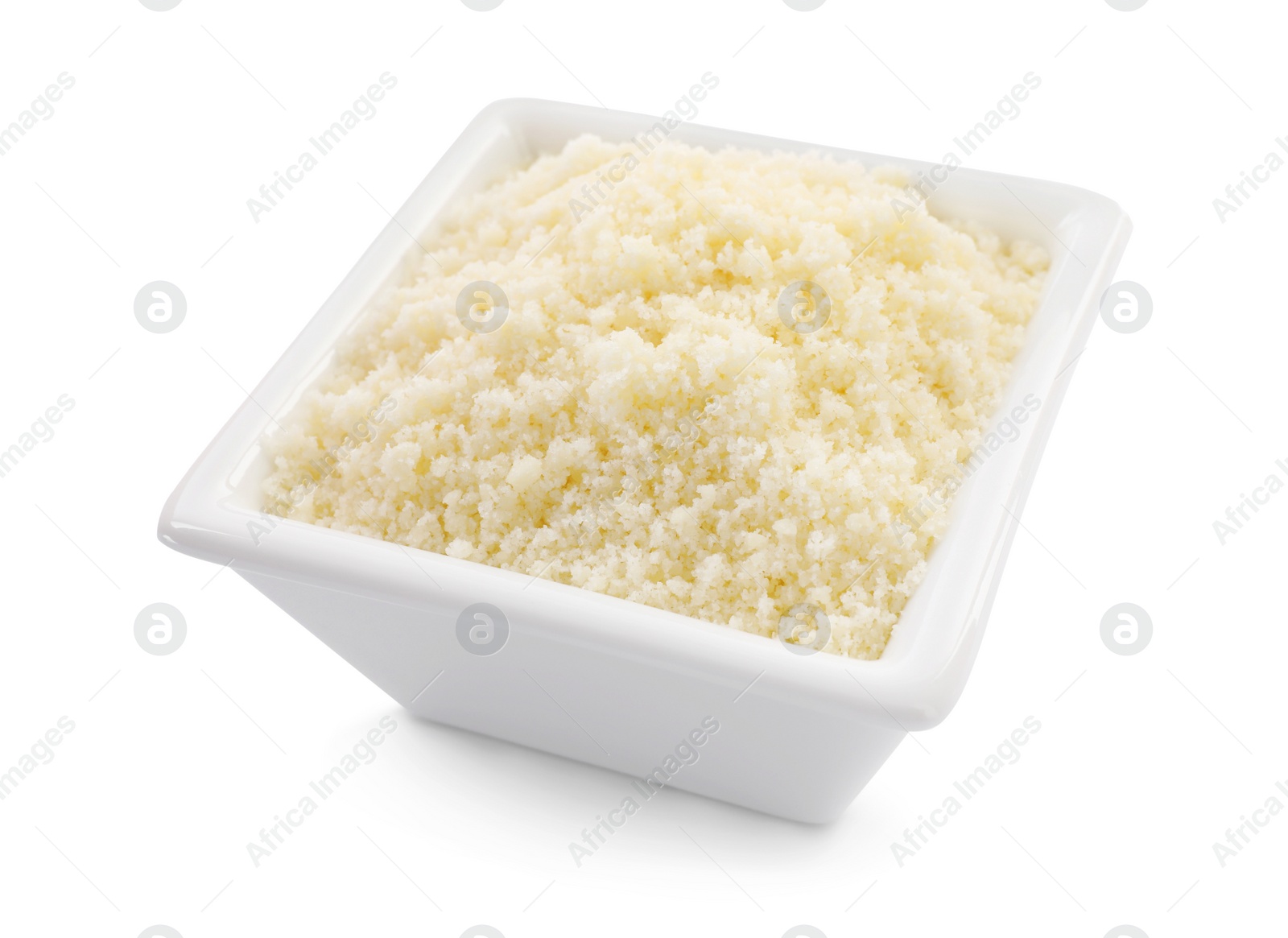 Photo of Square bowl with grated parmesan cheese isolated on white