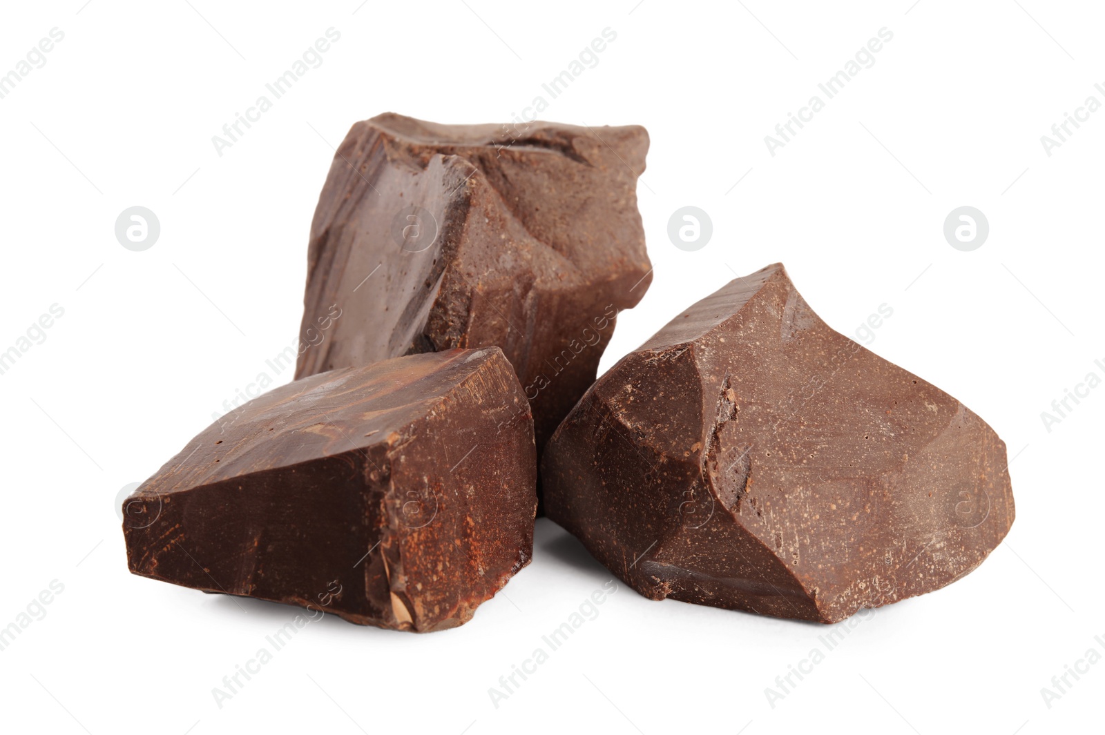 Photo of Pieces of tasty milk chocolate on white background