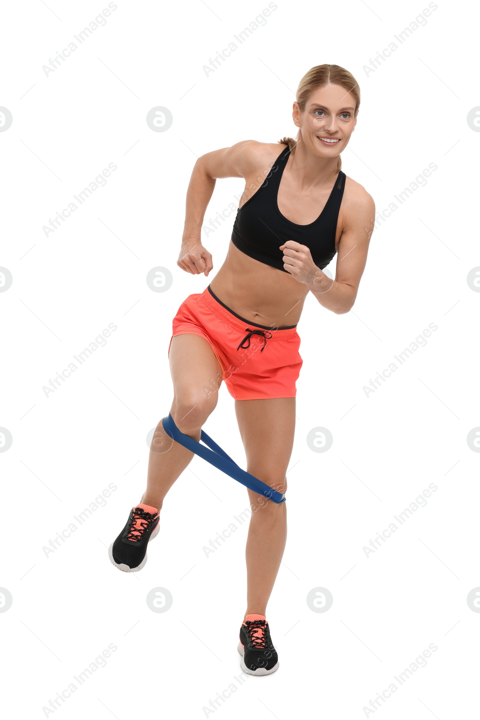 Photo of Woman exercising with elastic resistance band on white background