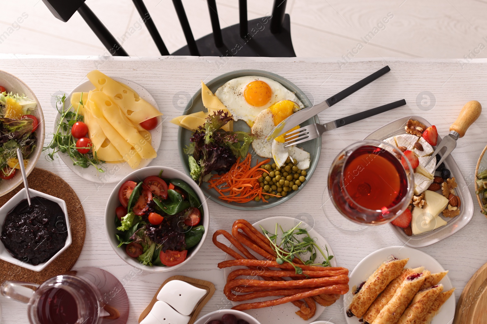 Photo of Many different dishes served on buffet table for brunch, flat lay