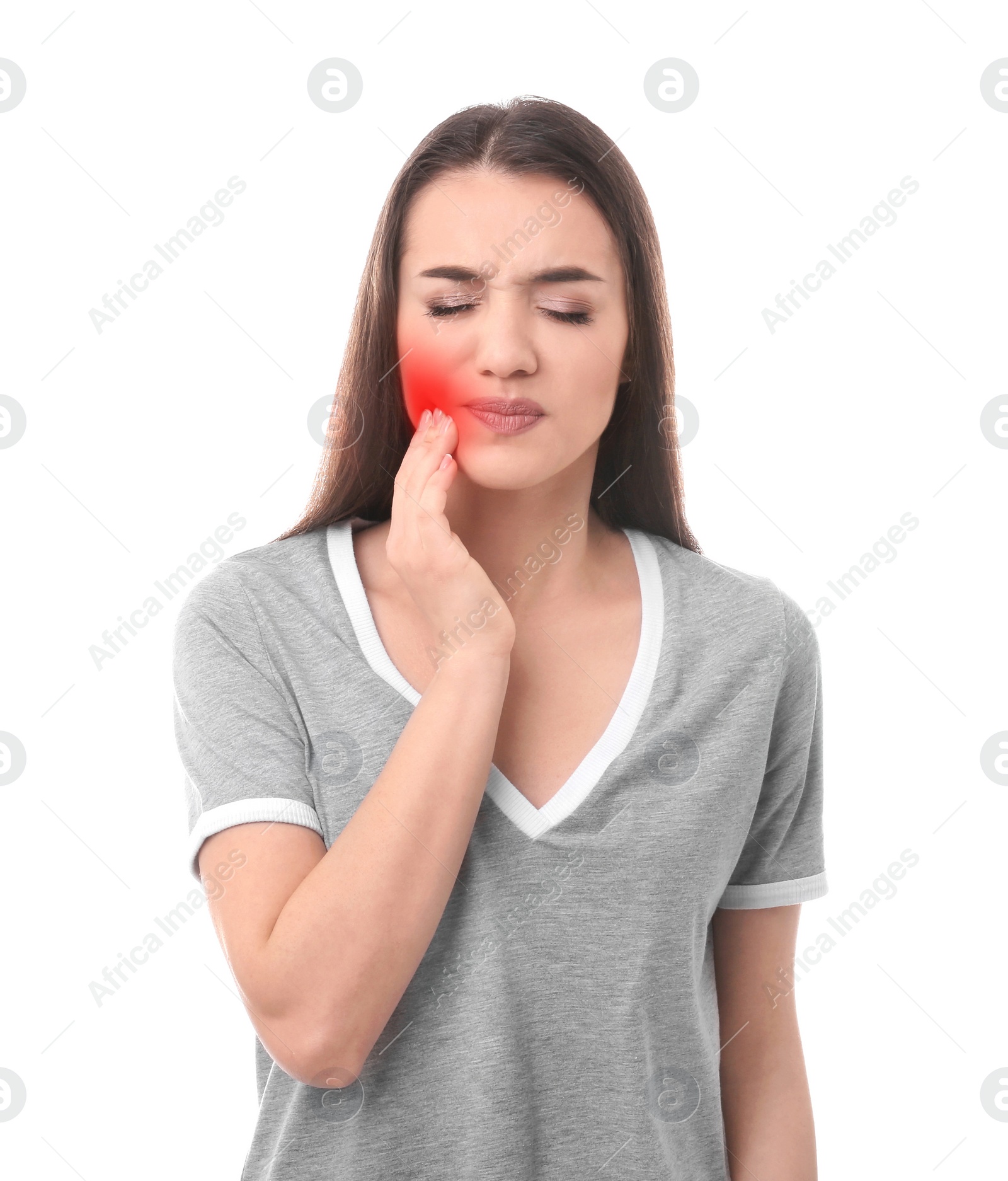 Image of Young woman suffering from toothache on white background