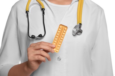 Doctor holding blister of oral contraception pills on white background, closeup