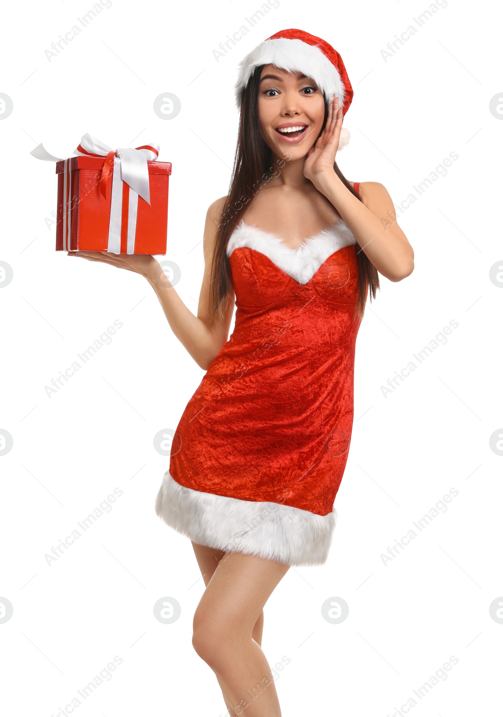 Photo of Beautiful Asian woman in Santa costume with Christmas gift on white background