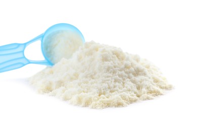 Powdered infant formula and scoop on white background. Baby milk