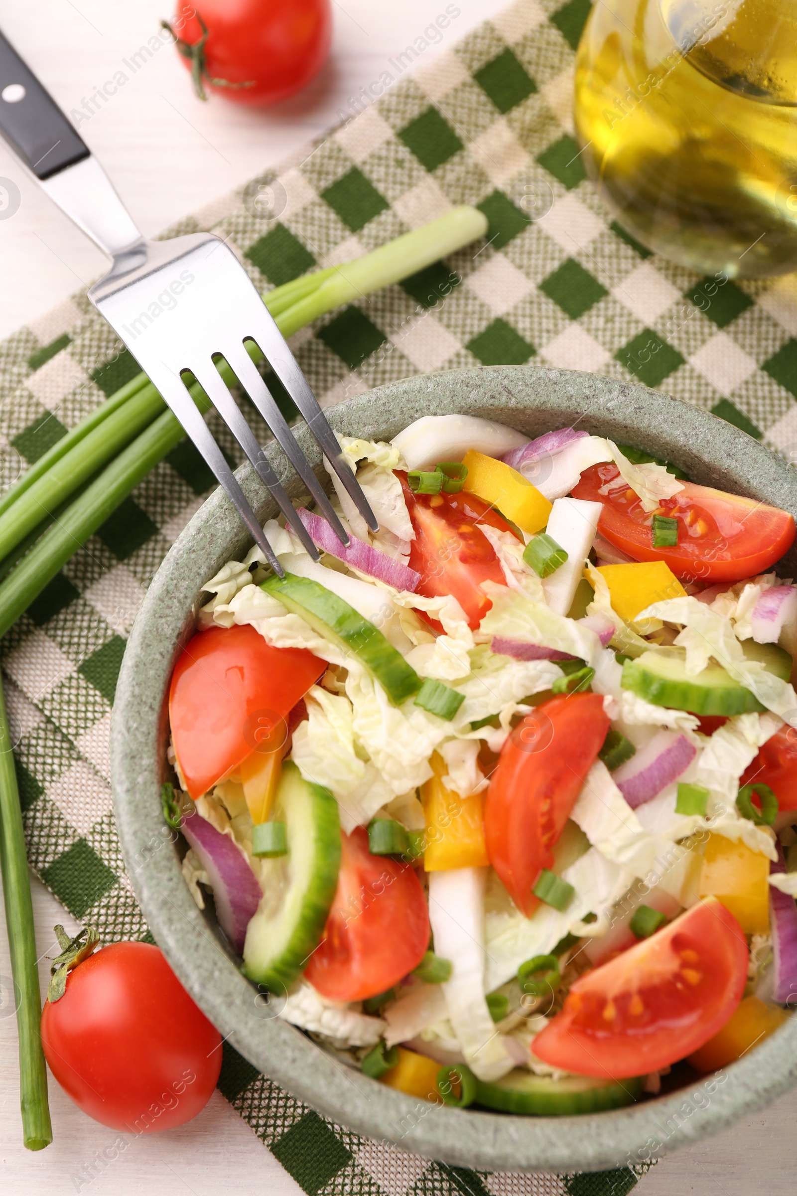 Photo of Tasty salad with Chinese cabbage served on white wooden table, flat lay