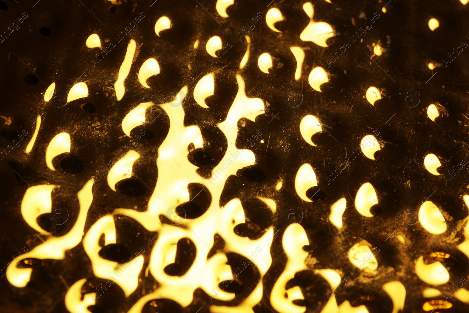 Photo of Closeup view of shiny golden surface as background