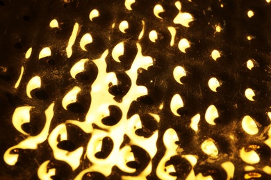 Closeup view of shiny golden surface as background