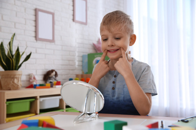 Photo of Cute little boy at speech therapist office