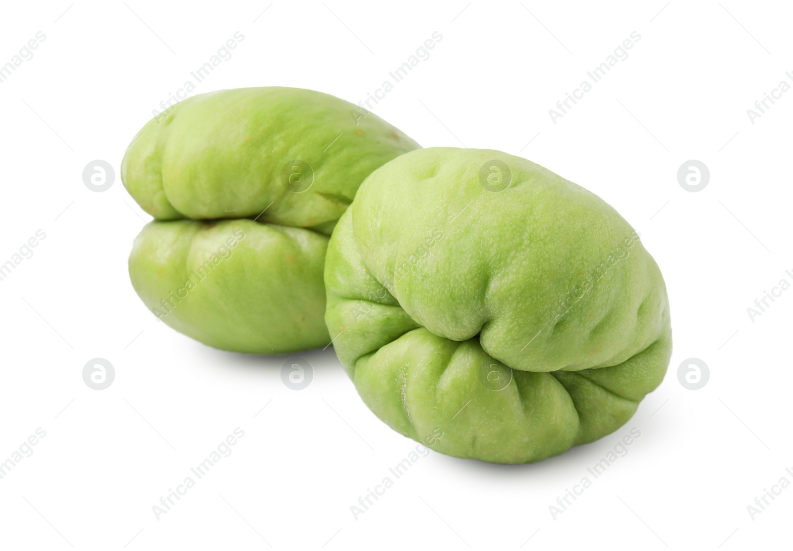 Photo of Two fresh green chayote isolated on white