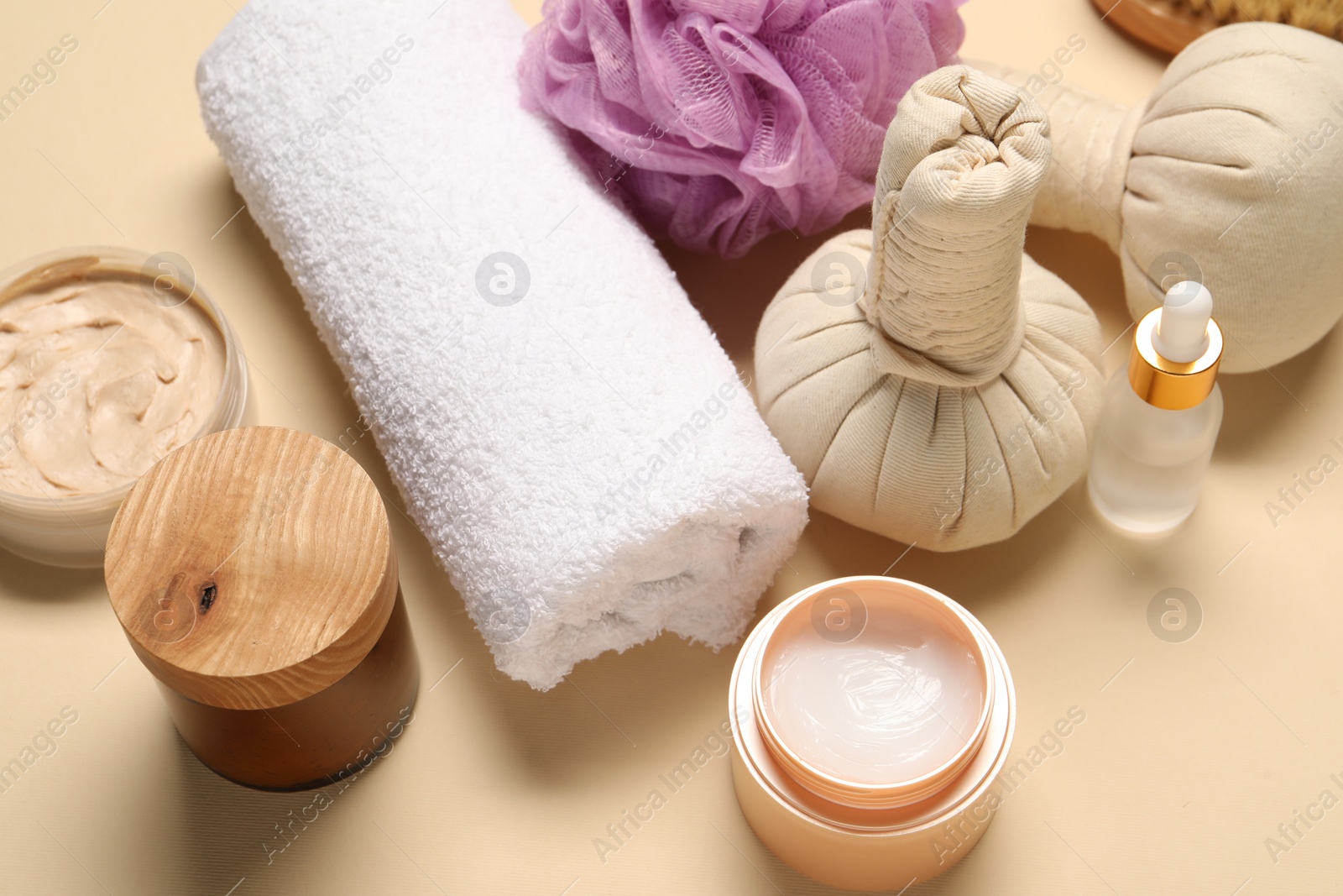 Photo of Bath accessories. Personal care products on beige background, above view