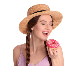 Beautiful young woman wearing stylish hat with donut on white background