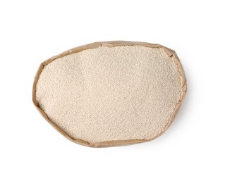Granulated yeast in paper bag on white background, top view