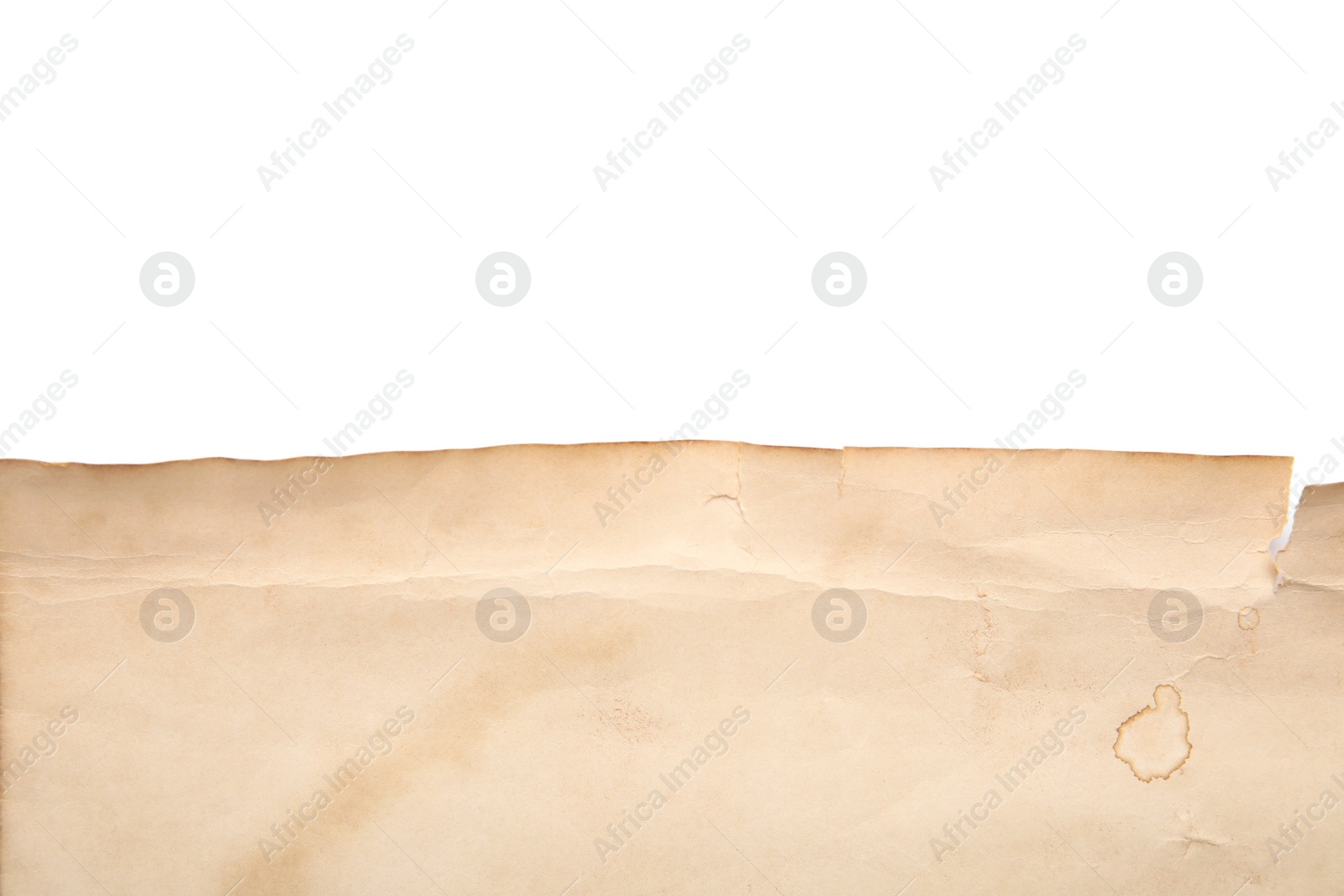 Photo of Sheet of old paper isolated on white, top view. Space for text