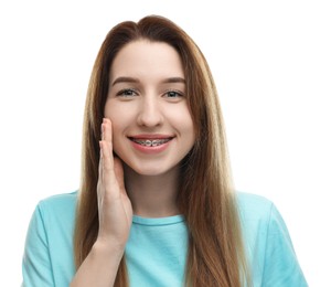 Portrait of smiling woman with dental braces on white background