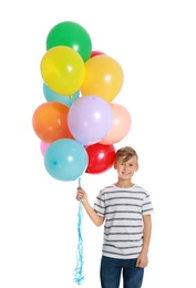 Photo of Little boy holding bunch of colorful balloons on white background