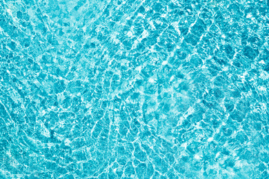 Image of Swimming pool with clean water as background. Summer vacation