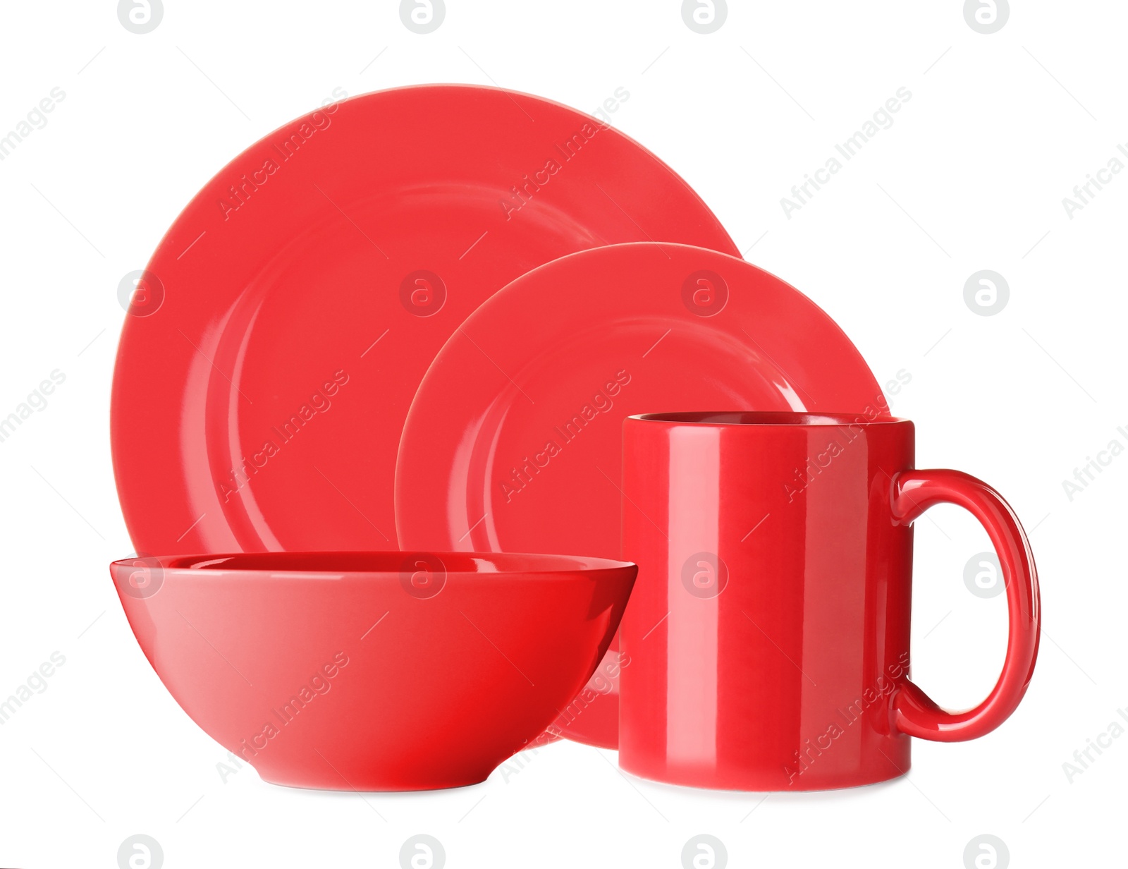 Image of Set of beautiful red dinnerware on white background