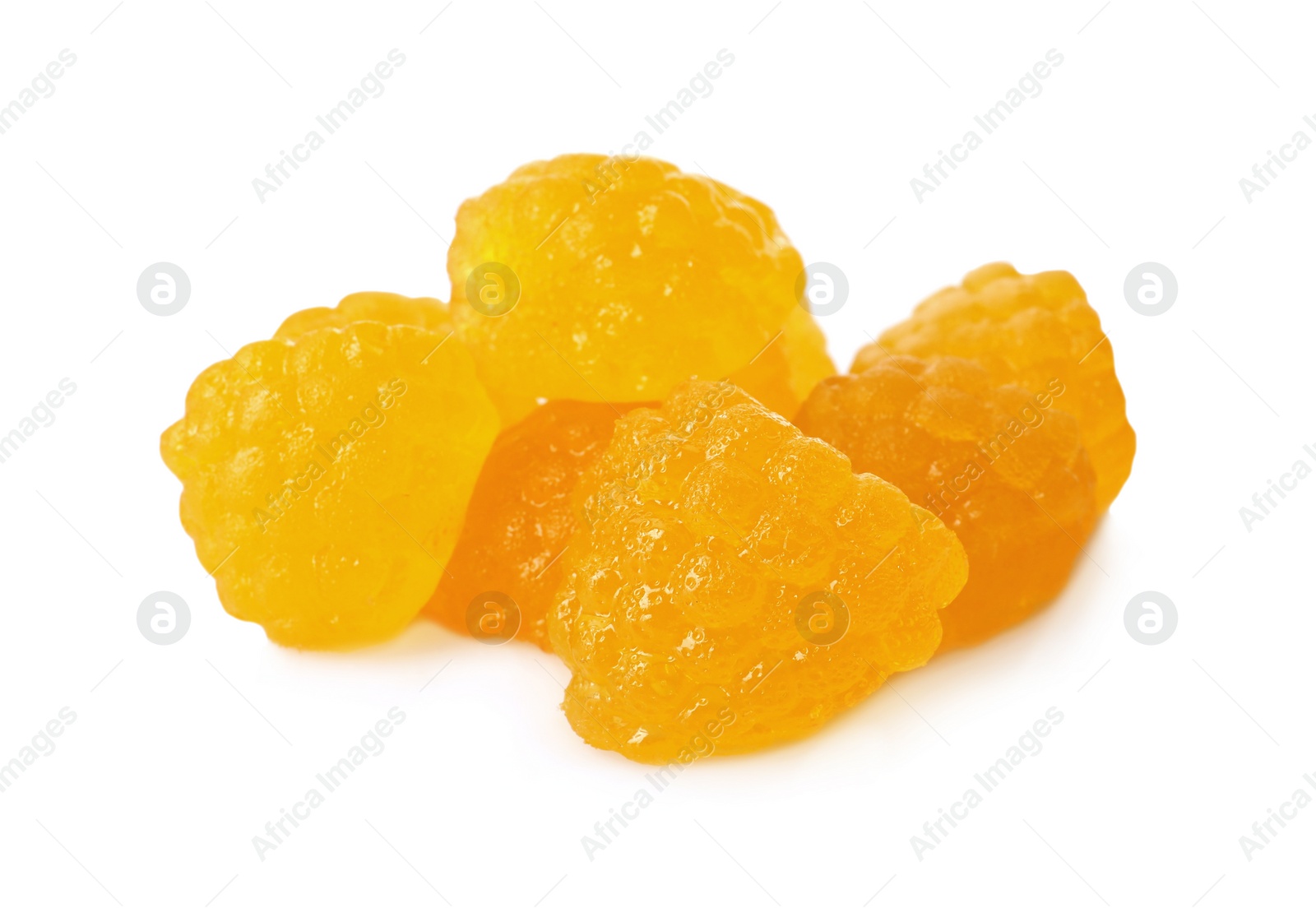 Photo of Delicious gummy golden raspberry candies on white background