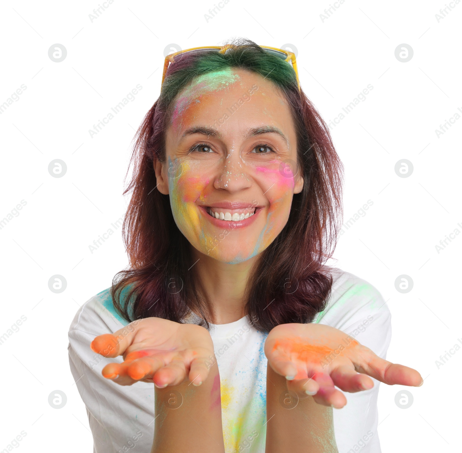 Photo of Woman covered with colorful powder dyes on white background. Holi festival celebration