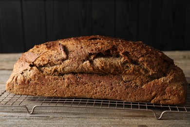 Freshly baked sourdough bread on wooden table