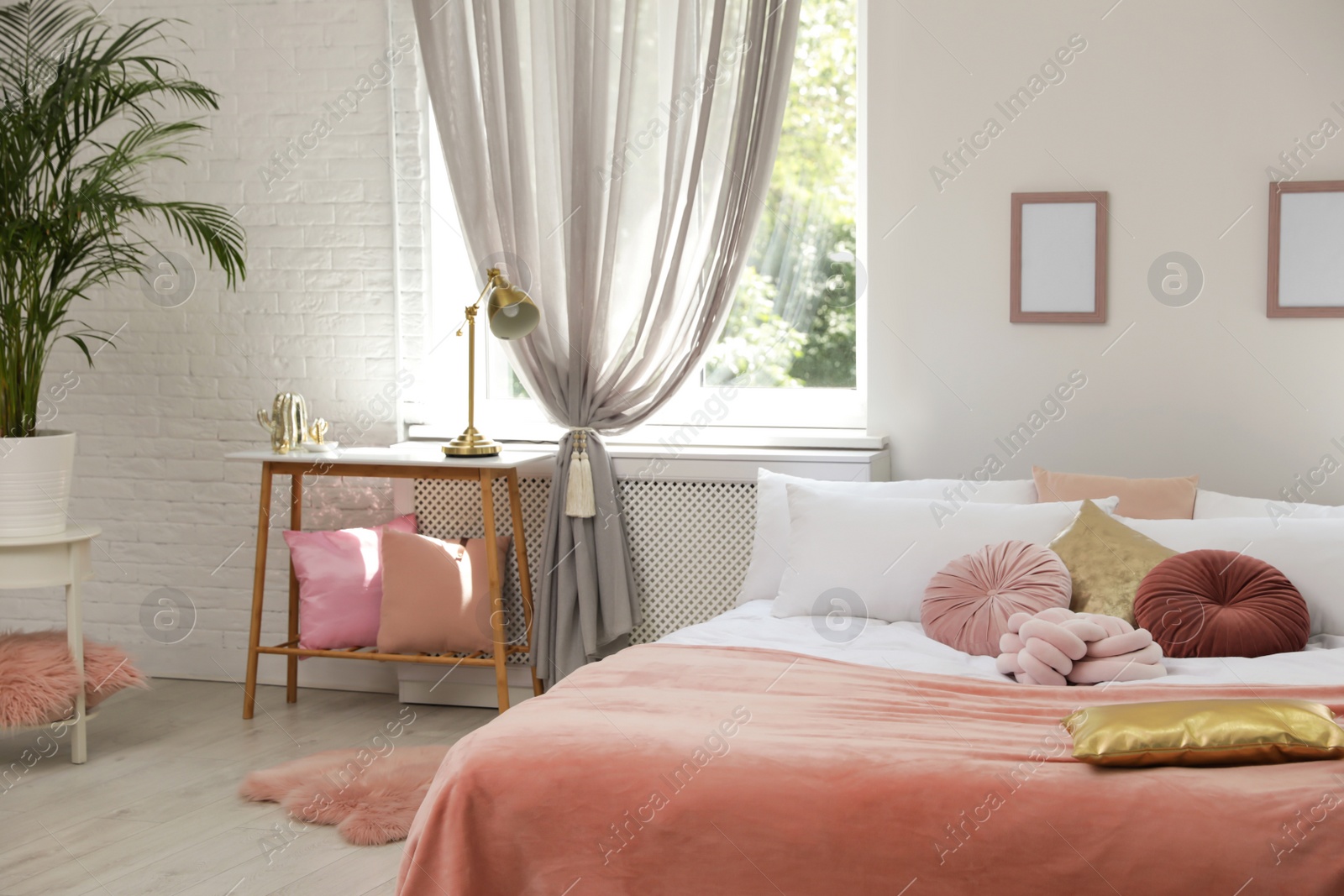 Photo of Stylish modern room interior with comfortable double bed