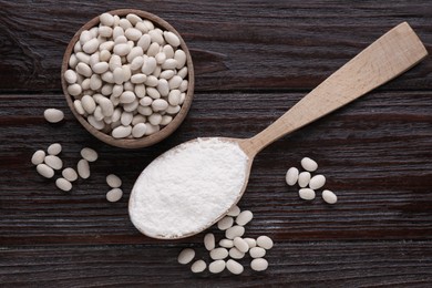 Photo of Kidney bean flour and seeds on wooden table, flat lay