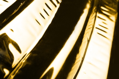 Closeup view of shiny golden surface as background