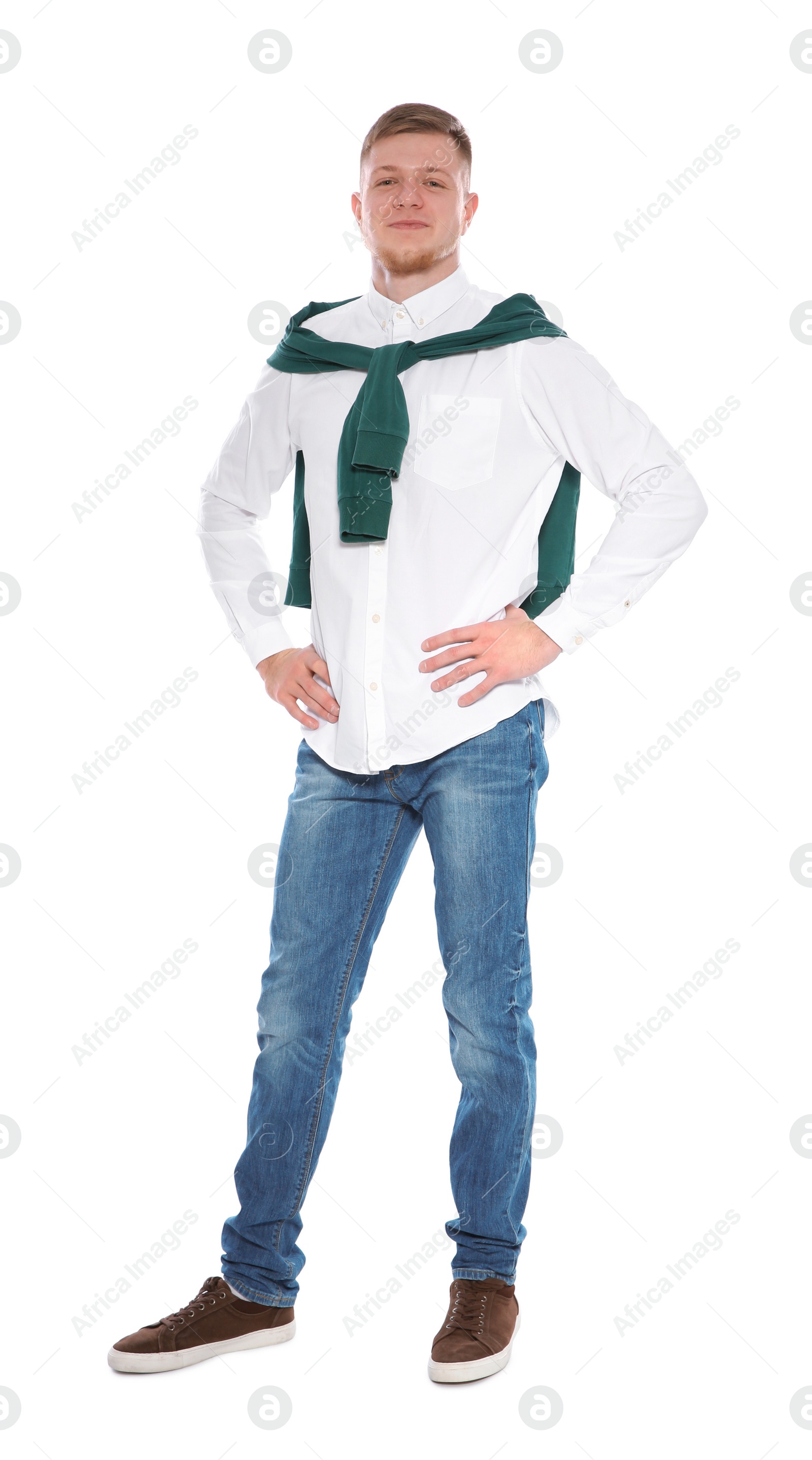 Photo of Full length portrait of handsome young man on white background