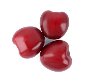 Photo of Tasty ripe red cherries isolated on white, top view