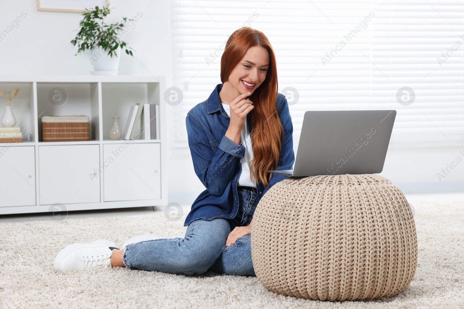 Photo of Woman having video chat via laptop at home