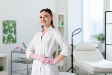 Professional cosmetologist in medical uniform in clinic