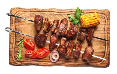 Photo of Metal skewers with delicious shish kebabs, rosemary, parsley and vegetables isolated on white, top view