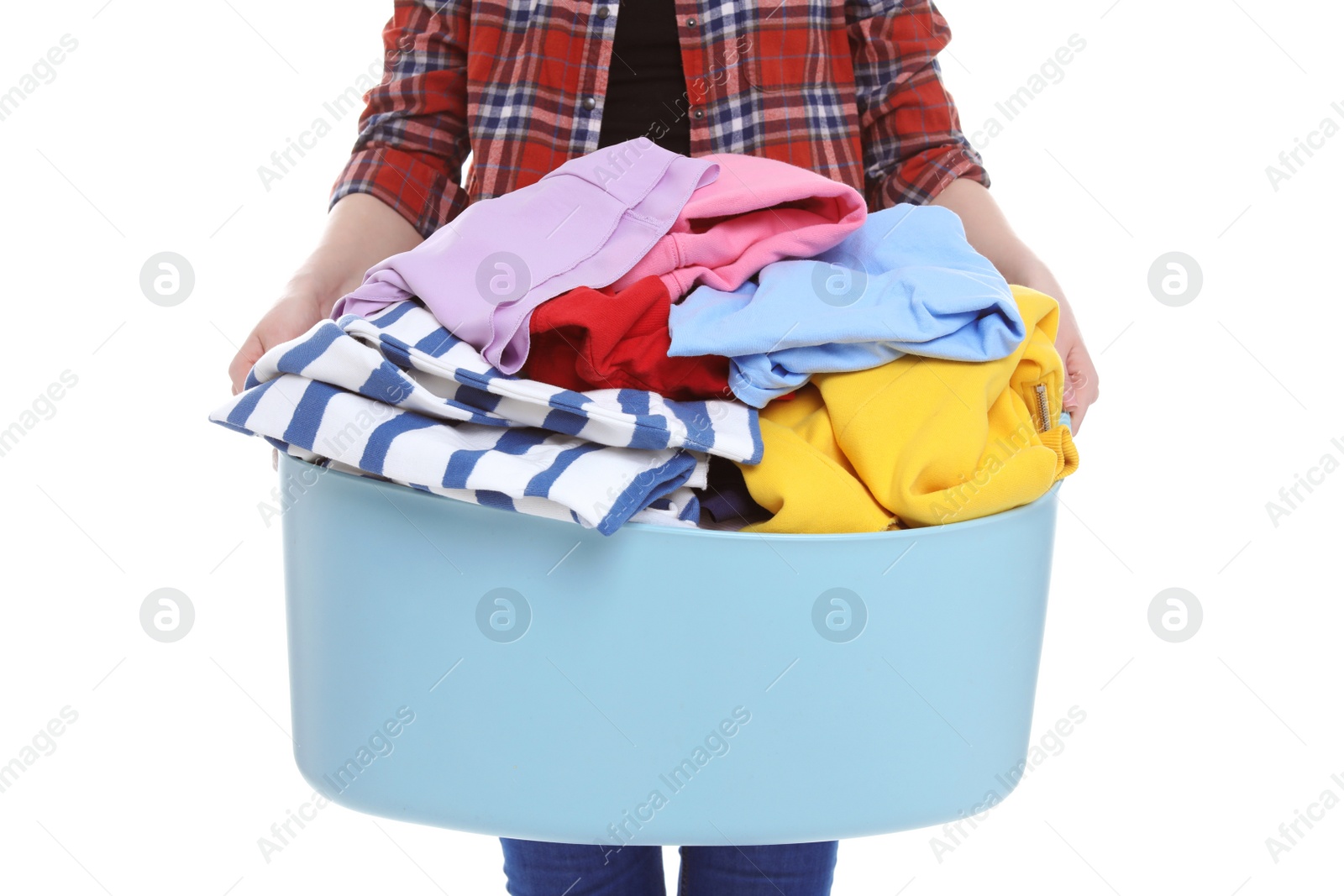 Photo of Woman holding laundry basket with dirty clothes on white background