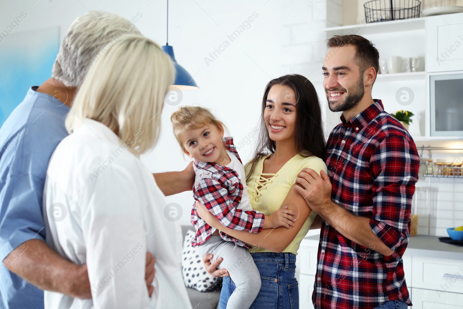 Photo of Happy family at home. Reunion of generations