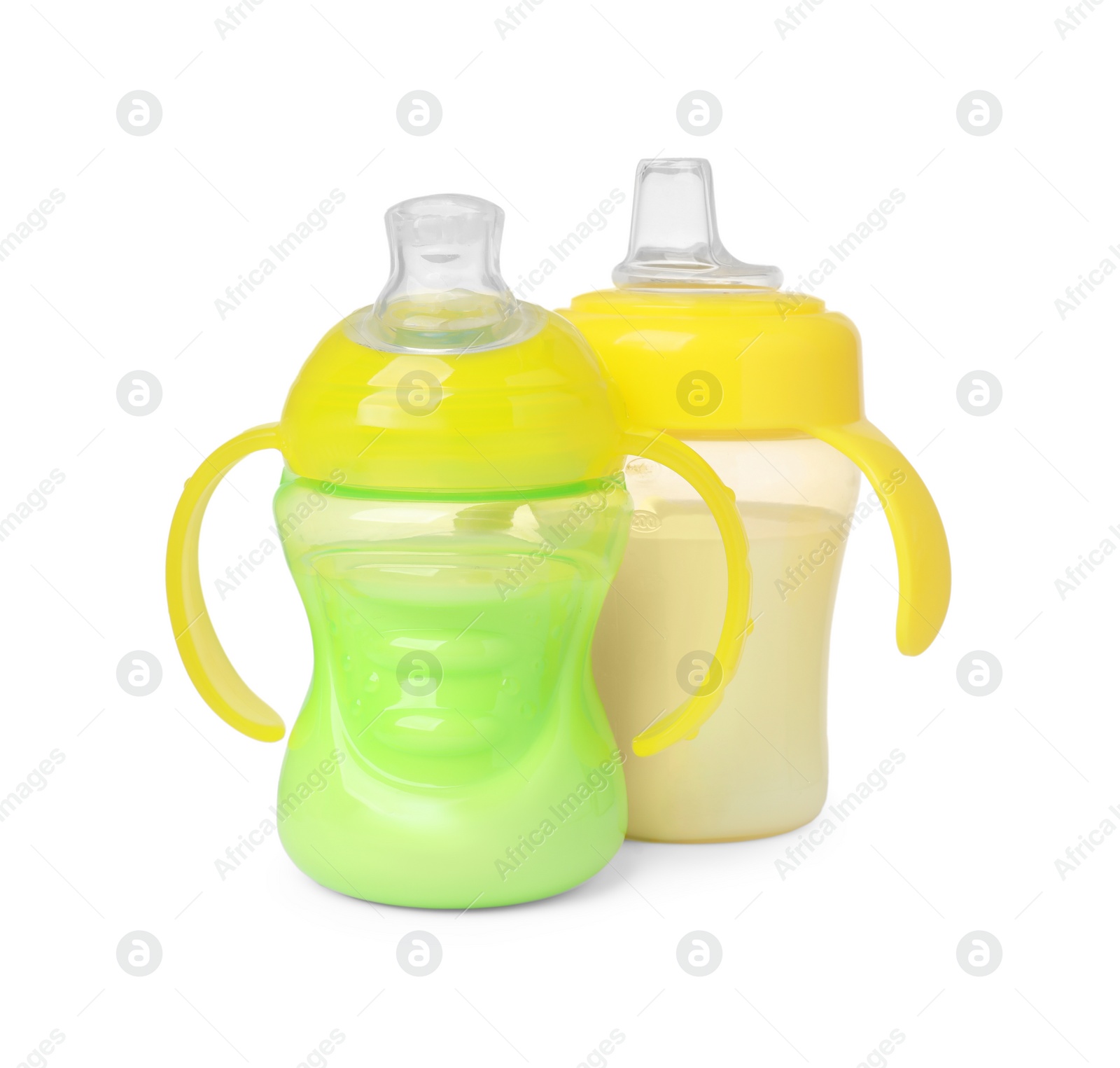 Photo of Feeding bottles with milk on white background