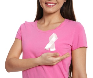 Photo of Woman with silk ribbon on white background, closeup. Breast cancer awareness concept