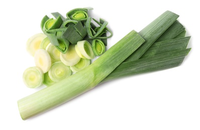 Photo of Fresh raw leek on white background, top view. Ripe onion