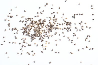 Photo of Chia seeds isolated on white, top view