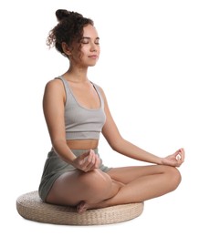 Photo of Beautiful African-American woman meditating on white background