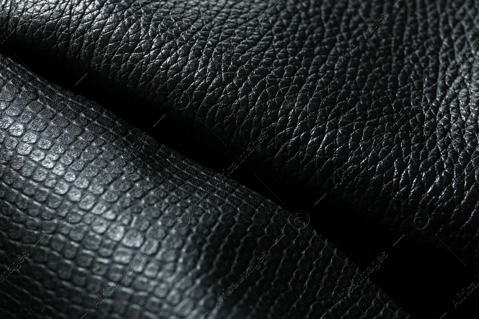 Photo of Black natural leather as background, above view