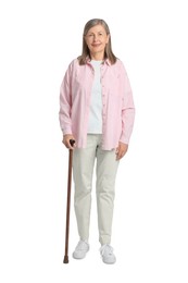 Photo of Senior woman with walking cane on white background