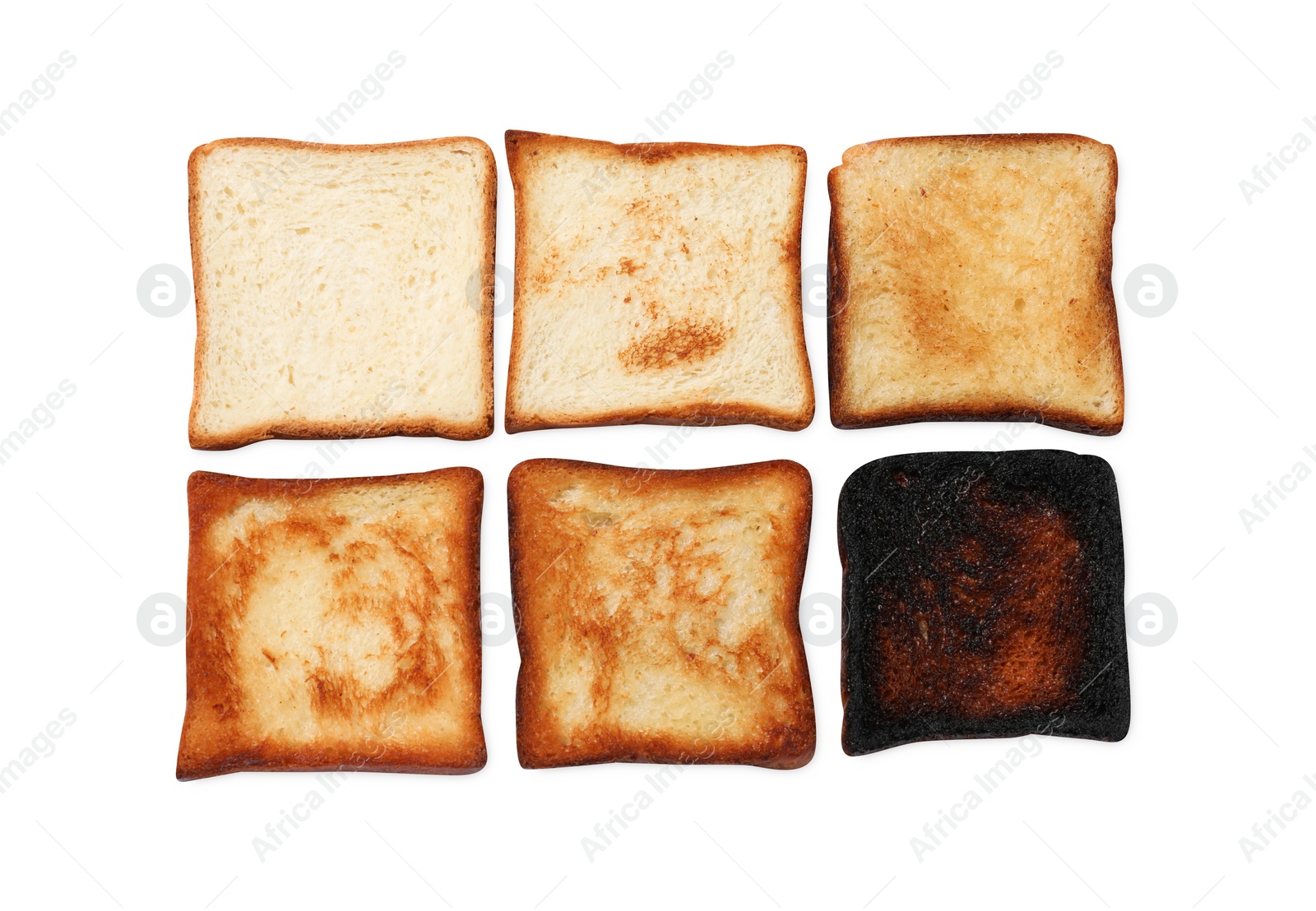 Photo of Toasting doneness. Bread slices of different shades isolated on white, top view