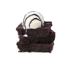 Photo of Tasty brownies with ice cream and chocolate sauce isolated on white