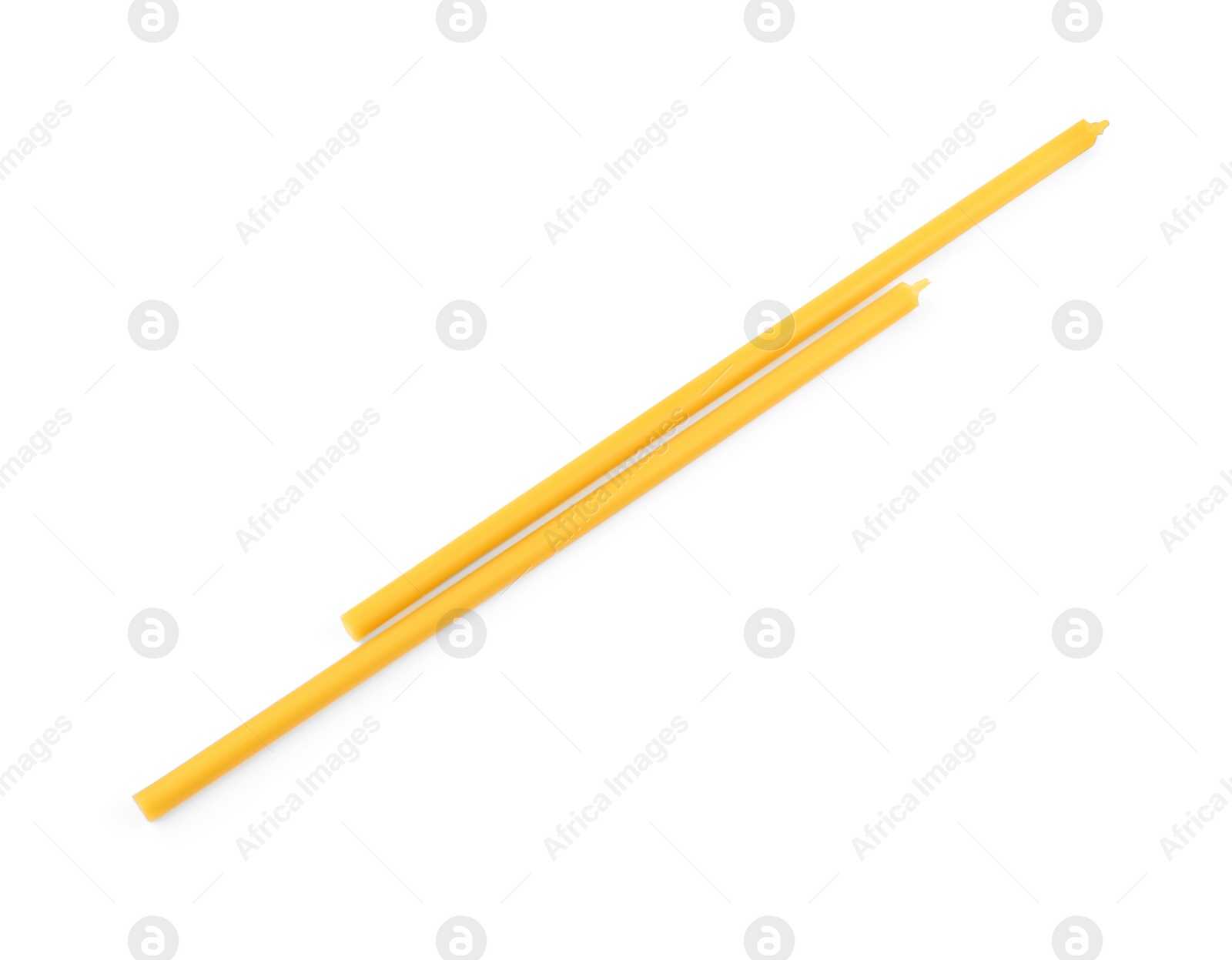Photo of New church candles on white background, top view