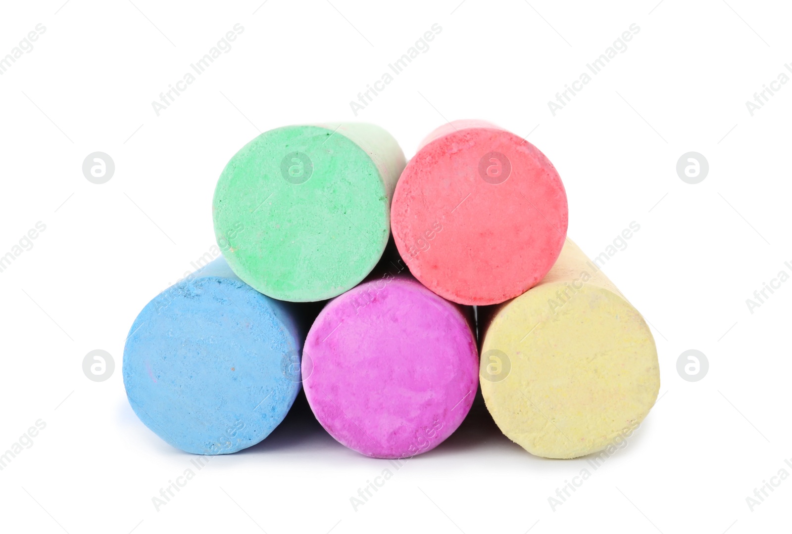 Photo of Color pieces of chalk on white background