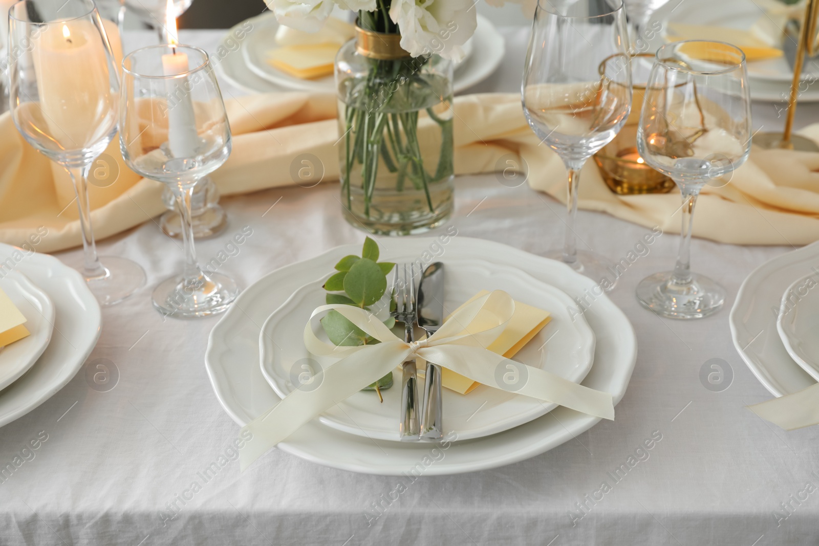 Photo of Festive table setting with beautiful floral decor
