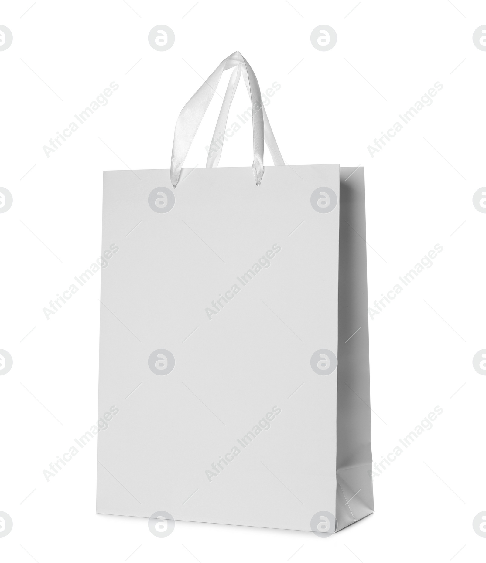 Photo of Paper shopping bag isolated on white. Mock up for design