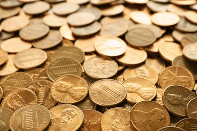 Pile of shiny USA one cent coins as background